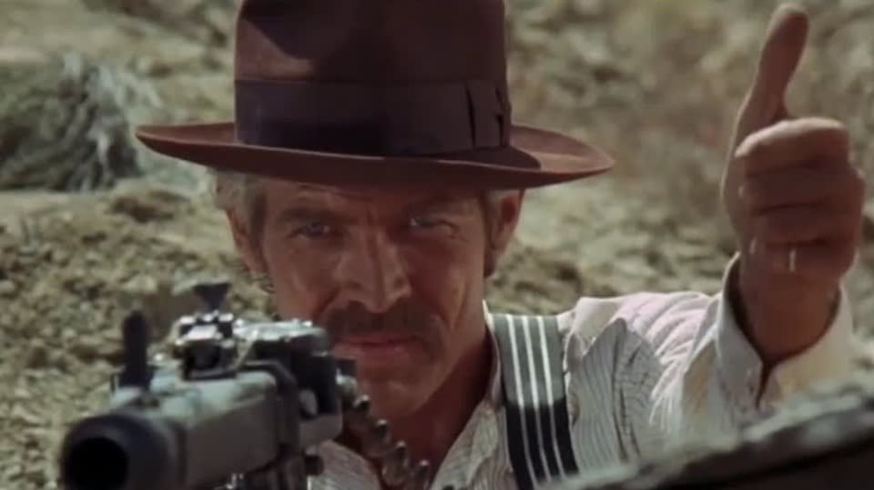 James Coburn ve filmu Kapsy plné dynamitu.